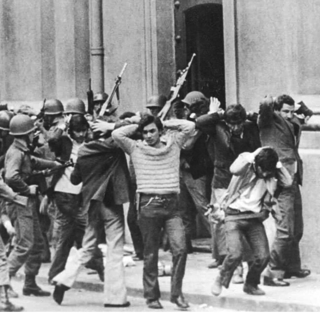 Students being taken away by military forces in Santiago, Chile