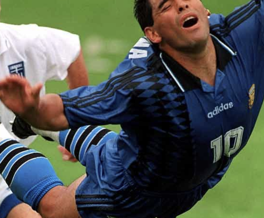 Diego Maradona holding the FIFA World Cup trophy after Argentina’s victory in 1986.

